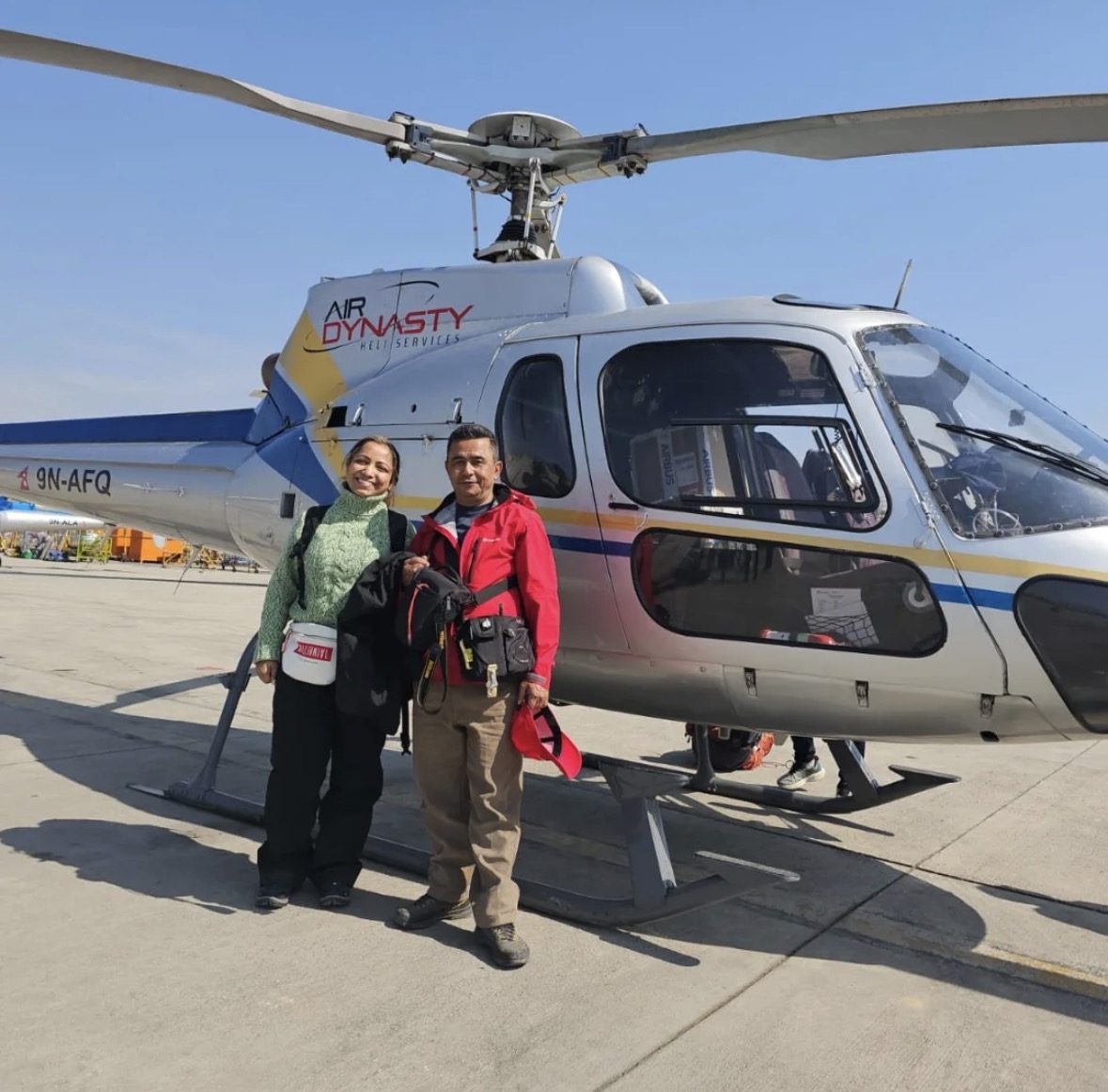 Helicopter on the tarmac at Kathmandu airport ready for an Everest Base Camp helicopter tour departure