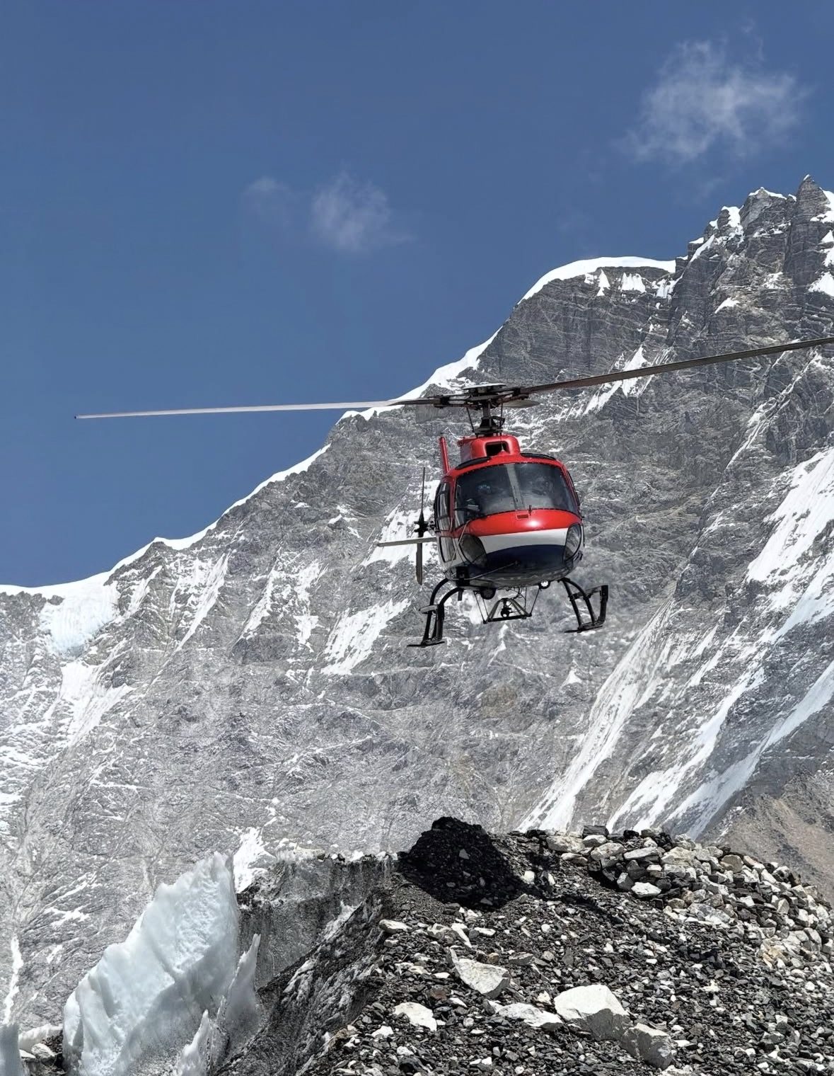Safety briefing before takeoff on an Everest Base Camp helicopter tour at Kathmandu helipad